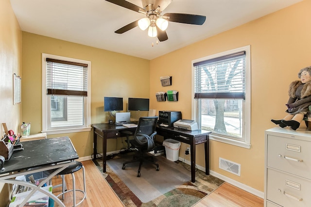 2074 Mcknight Rd N, North Saint Paul, MN 55109 - office space with light wood-style floors and ceiling fan