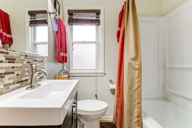 2074 Mcknight Rd N, North Saint Paul, MN 55109 - full bath featuring backsplash, vanity, and shower / bath combo