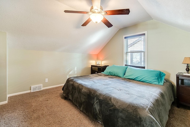 2074 Mcknight Rd N, North Saint Paul, MN 55109 - bedroom with carpet, vaulted ceiling, ceiling fan, and a textured ceiling