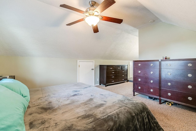 2074 Mcknight Rd N, North Saint Paul, MN 55109 - bedroom with lofted ceiling, carpet flooring, ceiling fan, and a textured ceiling