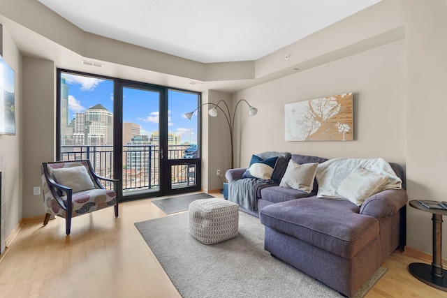 500 Grant St Unit 2109, Minneapolis, MN 55404 - living room featuring light wood-style floors and a view of city