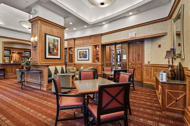 500 Grant St Unit 2109, Minneapolis, MN 55404 - dining area featuring dark colored carpet, a wainscoted wall, a decorative wall, and recessed lighting