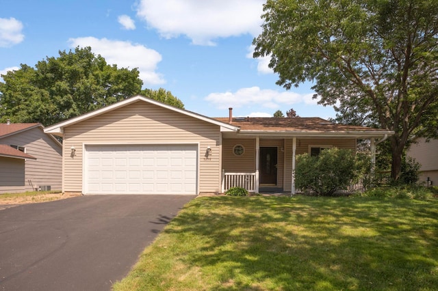 5698 Turtle Lake Rd, Shoreview, MN 55126 - ranch-style house featuring a garage, asphalt driveway, a front lawn, and covered porch