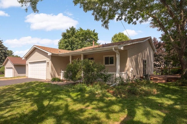 5698 Turtle Lake Rd, Shoreview, MN 55126 - single story home with asphalt driveway, an attached garage, and a front yard