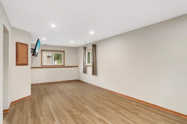 5698 Turtle Lake Rd, Shoreview, MN 55126 - spare room featuring light wood-style flooring and recessed lighting
