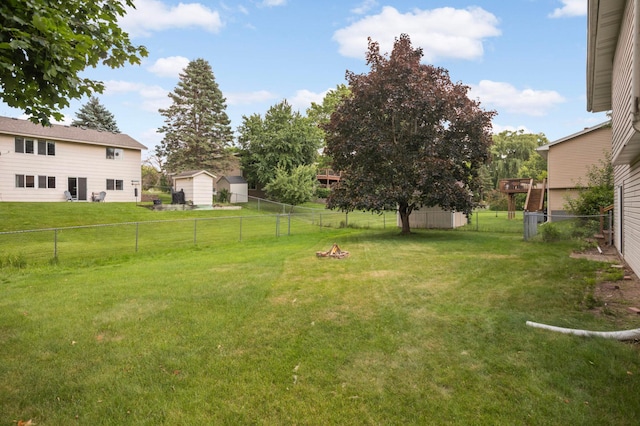 5698 Turtle Lake Rd, Shoreview, MN 55126 - fenced backyard with a fire pit