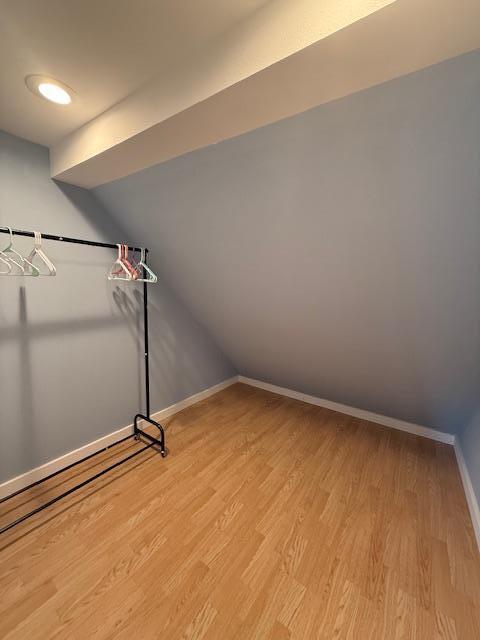 713 Grove St E, Caledonia, MN 55921 - spare room featuring light wood finished floors and lofted ceiling