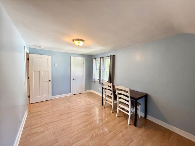 713 Grove St E, Caledonia, MN 55921 - office space featuring light wood-style floors and baseboards
