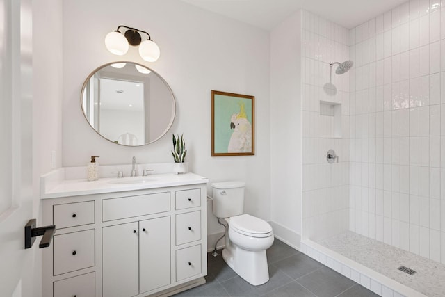 6176 Broadview Ave, Credit River Twp, MN 55372 - bathroom featuring a tile shower, vanity, and tile patterned floors