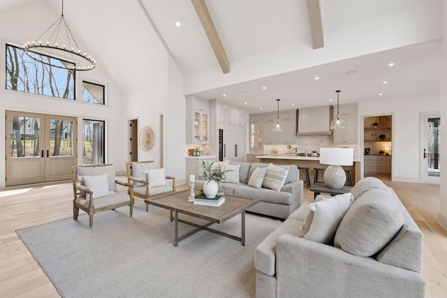6176 Broadview Ave, Credit River Twp, MN 55372 - living area featuring light wood-style flooring, recessed lighting, beam ceiling, high vaulted ceiling, and plenty of natural light