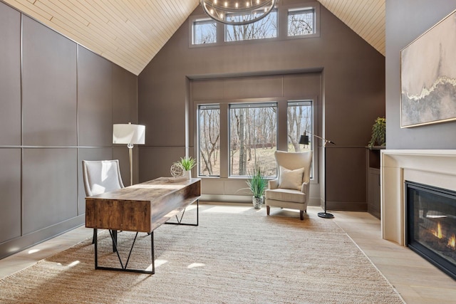 6176 Broadview Ave, Credit River Twp, MN 55372 - office area featuring wood ceiling, high vaulted ceiling, wood finished floors, and a fireplace with flush hearth