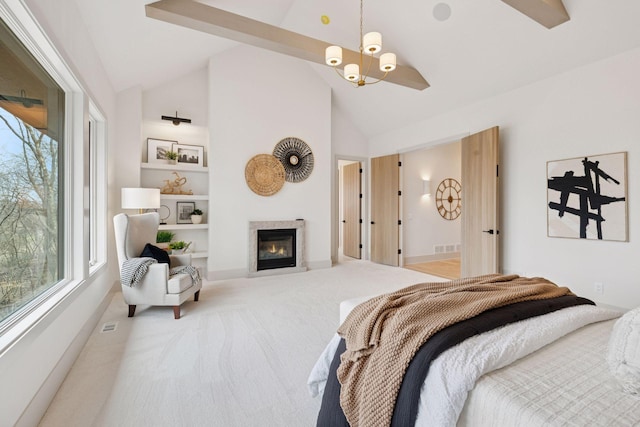 6176 Broadview Ave, Credit River Twp, MN 55372 - carpeted bedroom with multiple windows, a glass covered fireplace, and high vaulted ceiling