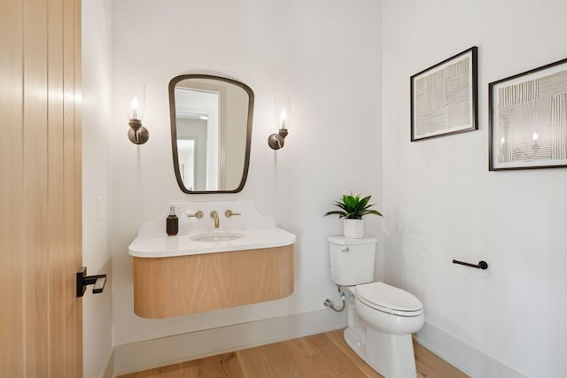 6176 Broadview Ave, Credit River Twp, MN 55372 - half bath featuring toilet and wood finished floors