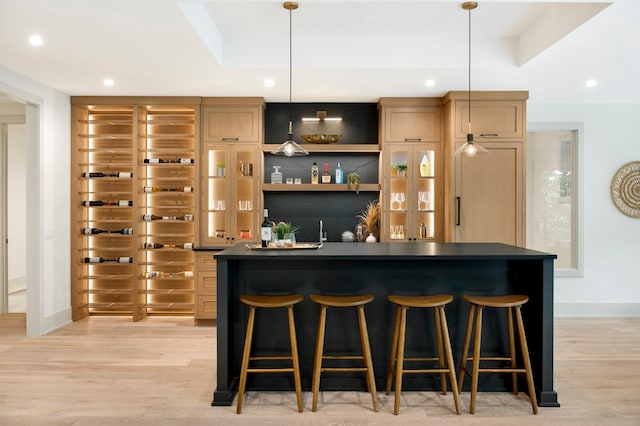 6176 Broadview Ave, Credit River Twp, MN 55372 - indoor wet bar featuring recessed lighting, light wood finished floors, and hanging light fixtures