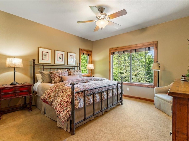13598 Ox Cove Trl, Crosslake, MN 56442 - bedroom featuring light colored carpet and a ceiling fan