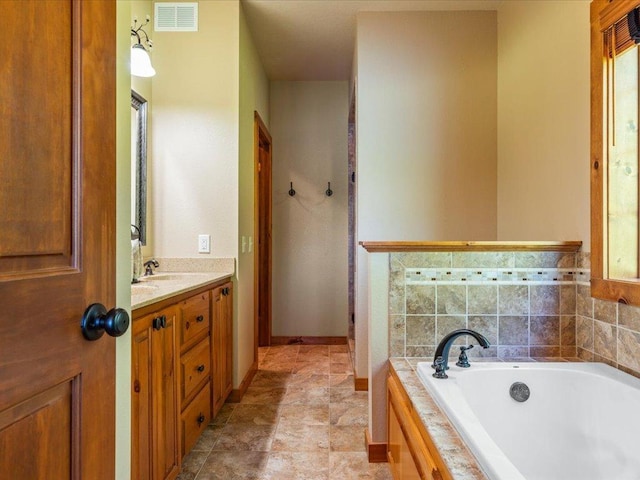 13598 Ox Cove Trl, Crosslake, MN 56442 - bathroom with vanity and a bath