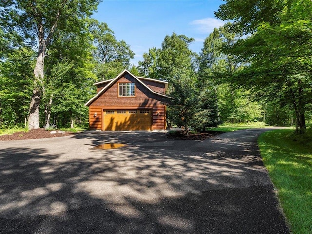 13598 Ox Cove Trl, Crosslake, MN 56442 - view of front facade with asphalt driveway