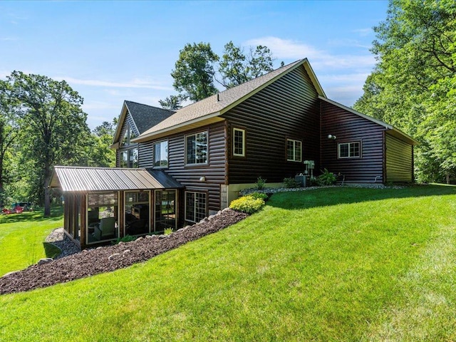 13598 Ox Cove Trl, Crosslake, MN 56442 - rear view of property with log veneer siding, a yard, and a shingled roof
