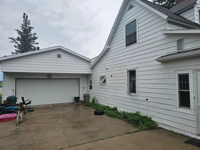 700 Hipple Ave, Henning, MN 56551 - view of home's exterior featuring driveway and a garage