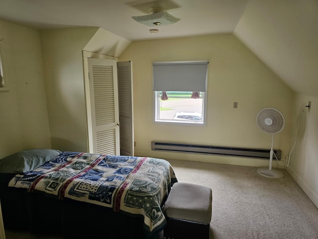 700 Hipple Ave, Henning, MN 56551 - carpeted bedroom with lofted ceiling and a baseboard radiator