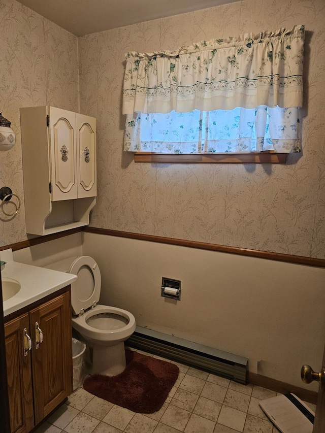 700 Hipple Ave, Henning, MN 56551 - bathroom featuring vanity and baseboard heating