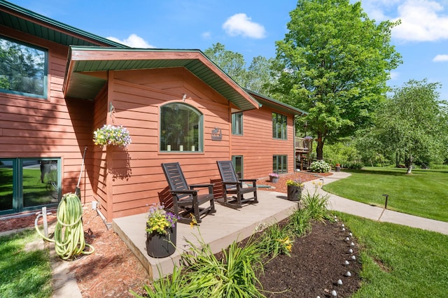 589 Seboe Rd, Wrenshall Twp, MN 55797 - view of property exterior with a yard and a wooden deck