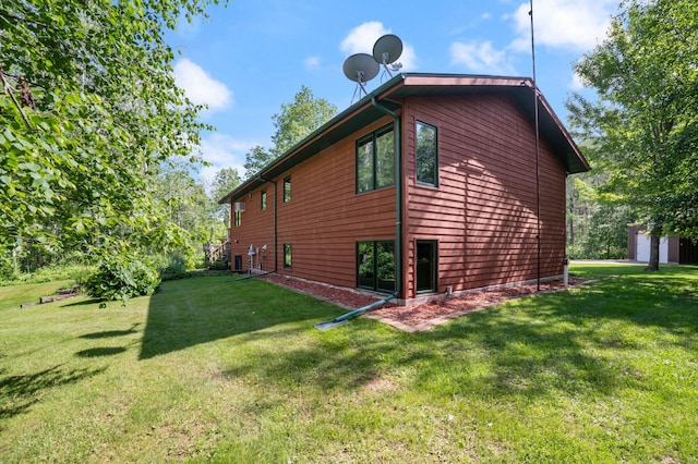 589 Seboe Rd, Wrenshall Twp, MN 55797 - view of side of property with a yard