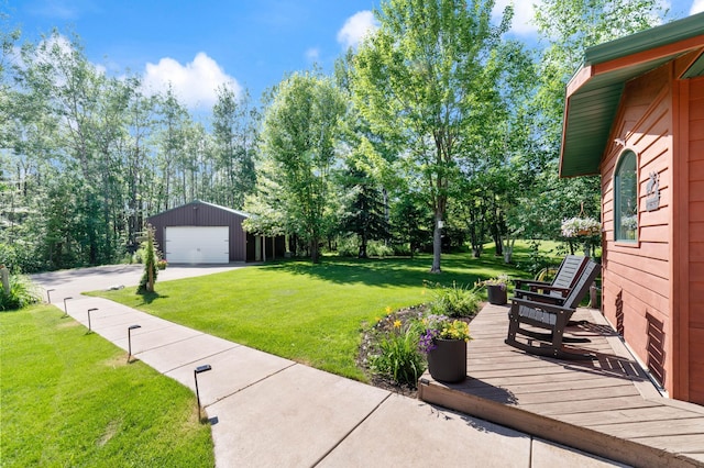 589 Seboe Rd, Wrenshall Twp, MN 55797 - view of grassy yard with a detached garage and an outdoor structure