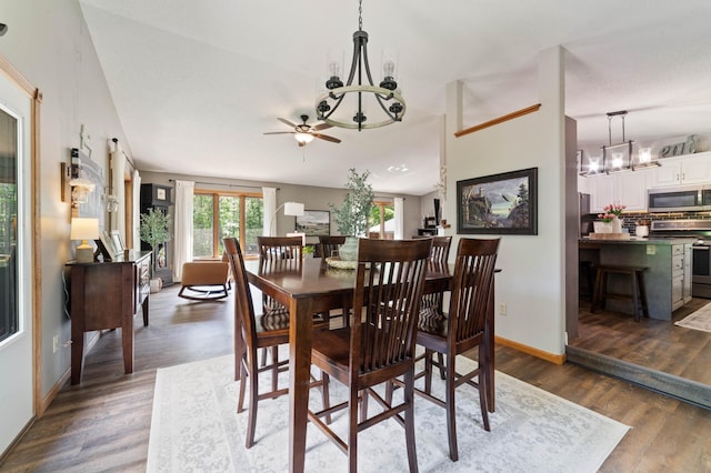 589 Seboe Rd, Wrenshall Twp, MN 55797 - dining room featuring a chandelier, a ceiling fan, and wood finished floors