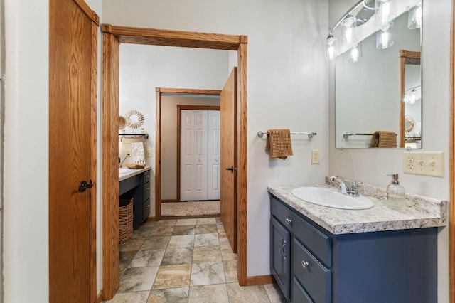589 Seboe Rd, Wrenshall Twp, MN 55797 - bathroom with vanity and stone finish flooring