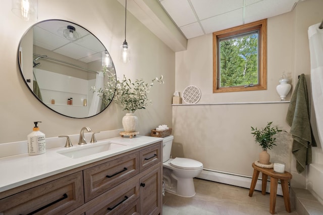 589 Seboe Rd, Wrenshall Twp, MN 55797 - bathroom with a drop ceiling, baseboard heating, vanity, a shower with curtain, and tile patterned flooring