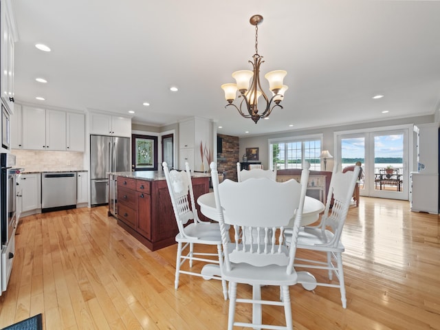 27842 Prairie Rose Rd, Elbow Lake, MN 56531 - dining space featuring a chandelier, light wood-style flooring, recessed lighting, and ornamental molding