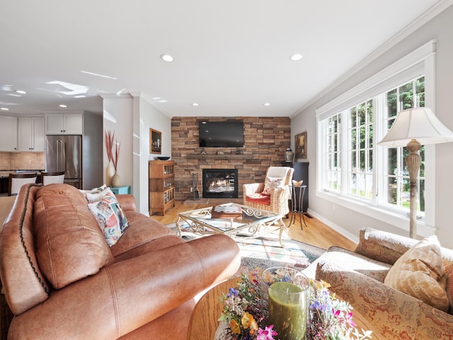 27842 Prairie Rose Rd, Elbow Lake, MN 56531 - living area featuring crown molding, recessed lighting, a fireplace, and light wood-type flooring