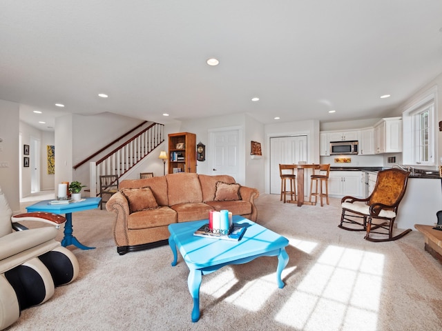 27842 Prairie Rose Rd, Elbow Lake, MN 56531 - living room featuring light carpet, stairway, and recessed lighting