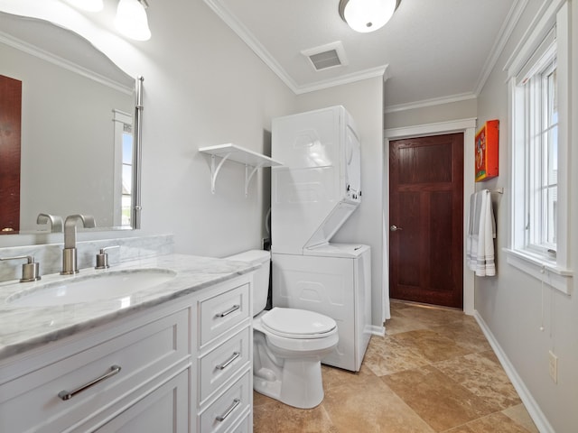 27842 Prairie Rose Rd, Elbow Lake, MN 56531 - bathroom featuring stacked washer / dryer, vanity, and ornamental molding
