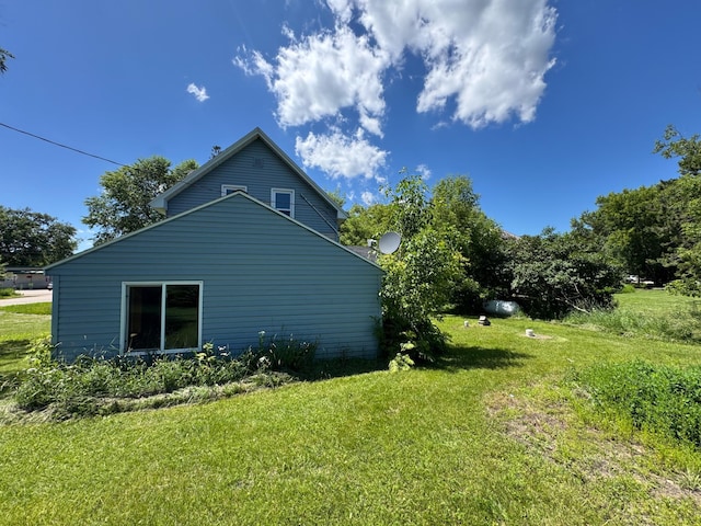 17864 County Road 66 NE, Eagle Bend, MN 56446 - view of side of home with a lawn