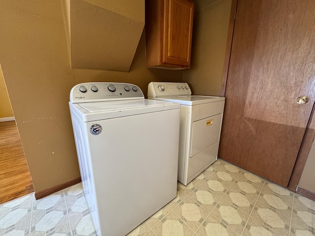 17864 County Road 66 NE, Eagle Bend, MN 56446 - washroom with cabinet space and washing machine and dryer