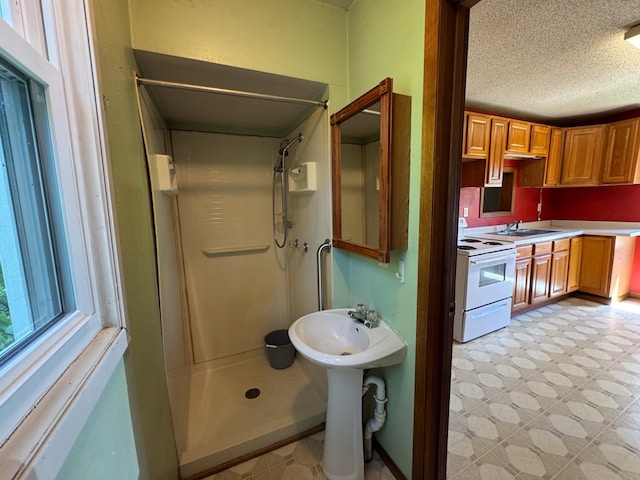 17864 County Road 66 NE, Eagle Bend, MN 56446 - full bath with tile patterned floors, a textured ceiling, and a stall shower