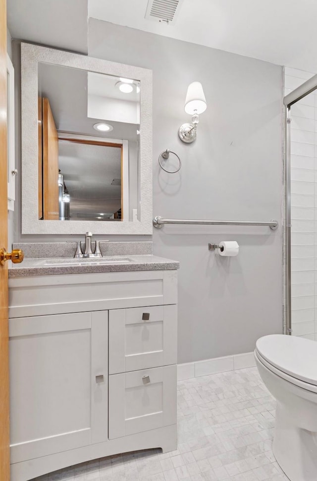 11 Eagle Ridge Rd, North Oaks, MN 55127 - bathroom with vanity, a shower with shower door, recessed lighting, and tile patterned floors