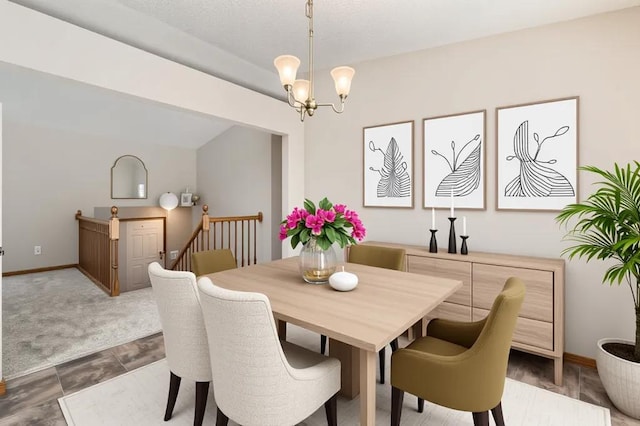 703 11th Ave SW, Isanti, MN 55040 - dining space featuring a chandelier and baseboards