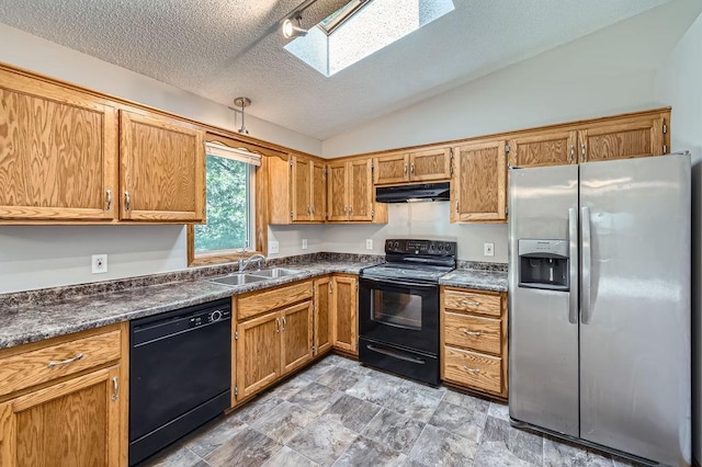 703 11th Ave SW, Isanti, MN 55040 - kitchen with black appliances, under cabinet range hood, dark countertops, a skylight, and lofted ceiling