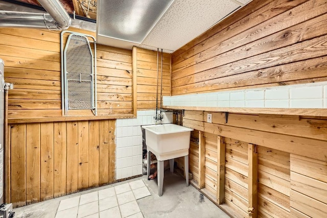 703 11th Ave SW, Isanti, MN 55040 - miscellaneous room with wood walls