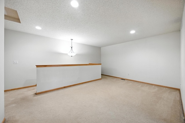 12240 Urbank St NE Unit G, Blaine, MN 55449 - carpeted empty room with recessed lighting and a textured ceiling