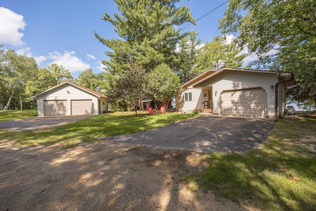 3925 Plainview Dr NW, Hackensack, MN 56452 - view of side of property featuring a lawn and a detached garage