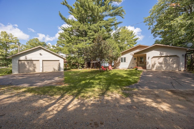 3925 Plainview Dr NW, Hackensack, MN 56452 - view of front facade featuring a detached garage, a front yard, and an outbuilding