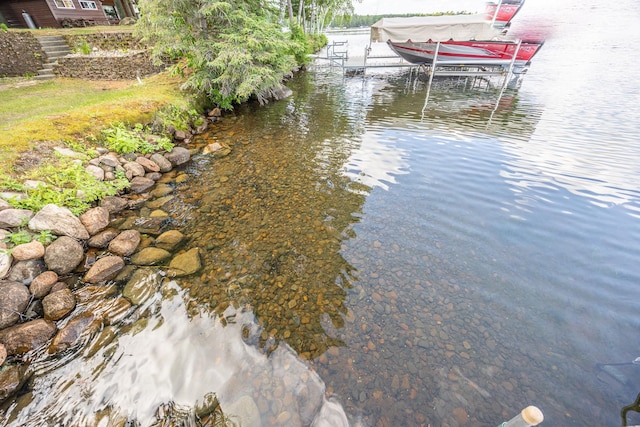 3925 Plainview Dr NW, Hackensack, MN 56452 - dock area featuring boat lift