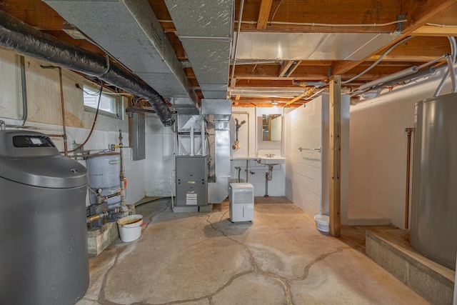3925 Plainview Dr NW, Hackensack, MN 56452 - below grade area featuring a water softener system, gas water heater, and heating unit