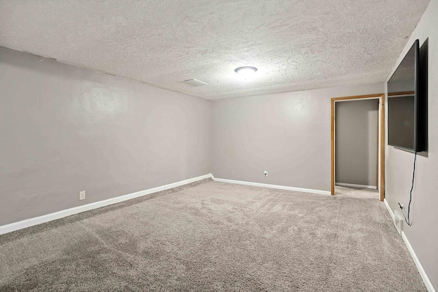 2314 347th Ave NE, Cambridge Twp, MN 55008 - unfurnished bedroom with carpet floors and a textured ceiling