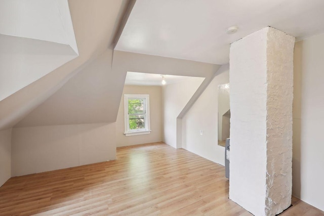 1535 Sherburne Ave, Saint Paul, MN 55104 - additional living space featuring wood finished floors and vaulted ceiling