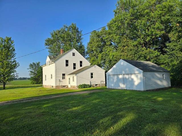 36789 State Highway 22, New Sweden Twp, MN 56082 - rear view of property with a yard, an outbuilding, and a chimney